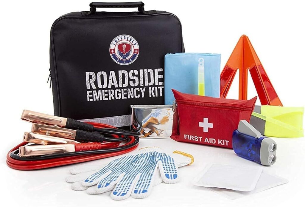 Roadside Emergency Car Kit with Jumper Cables - Car Essentials - Travel First Aid Kit, LED Flash Light, Rain Coat, Glow Stick, Safety Vest  More Ideal Emergency Kit for Car, Truck Or SUV (Small Kit)